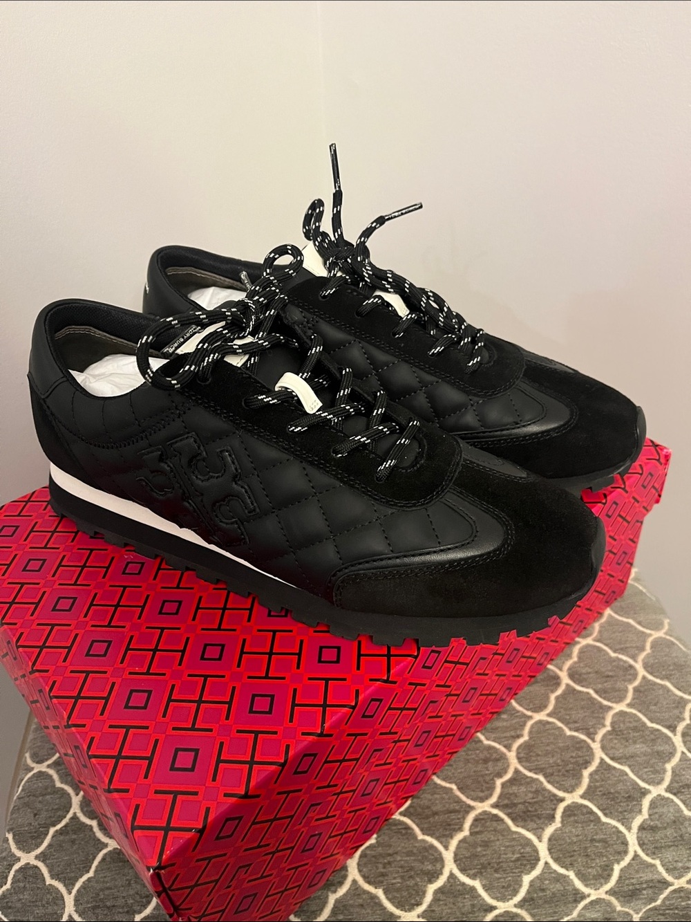 Women’s Tory Burch size 9 black quilted/leather and suede sneakers